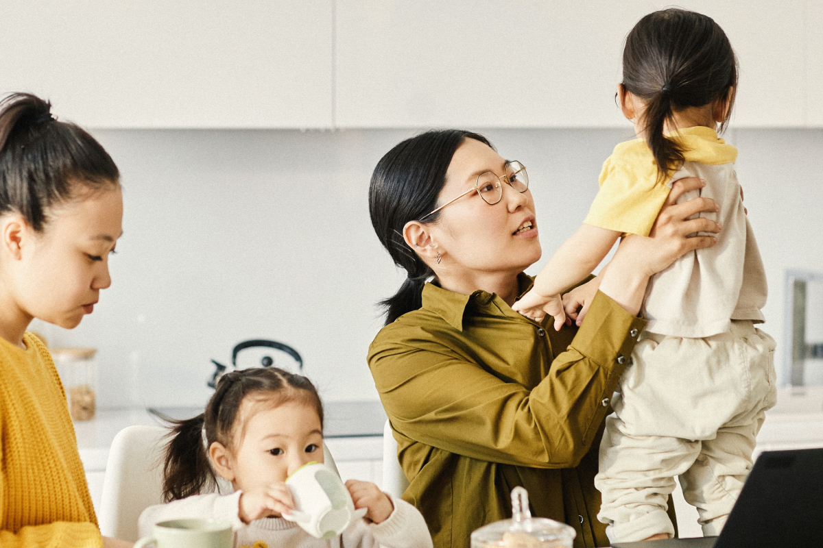 Woman holding a young child