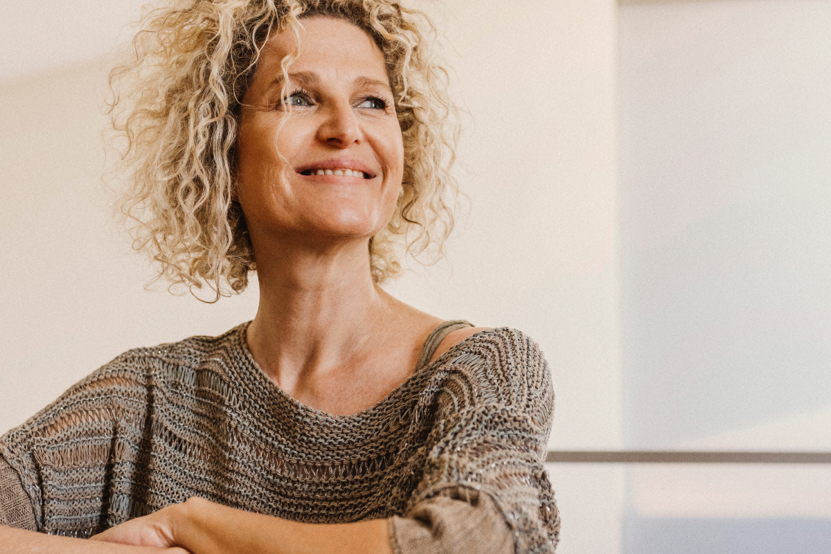 Woman smiling during a conversation